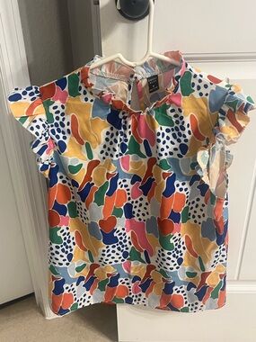 Woman’s Multicolor Flutter Sleeve Top